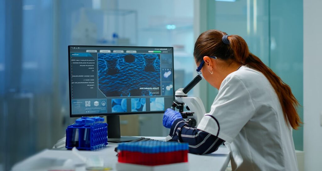 Pathologist at Sheba Medical Center analyzing biopsy samples with AI-powered pathology system
