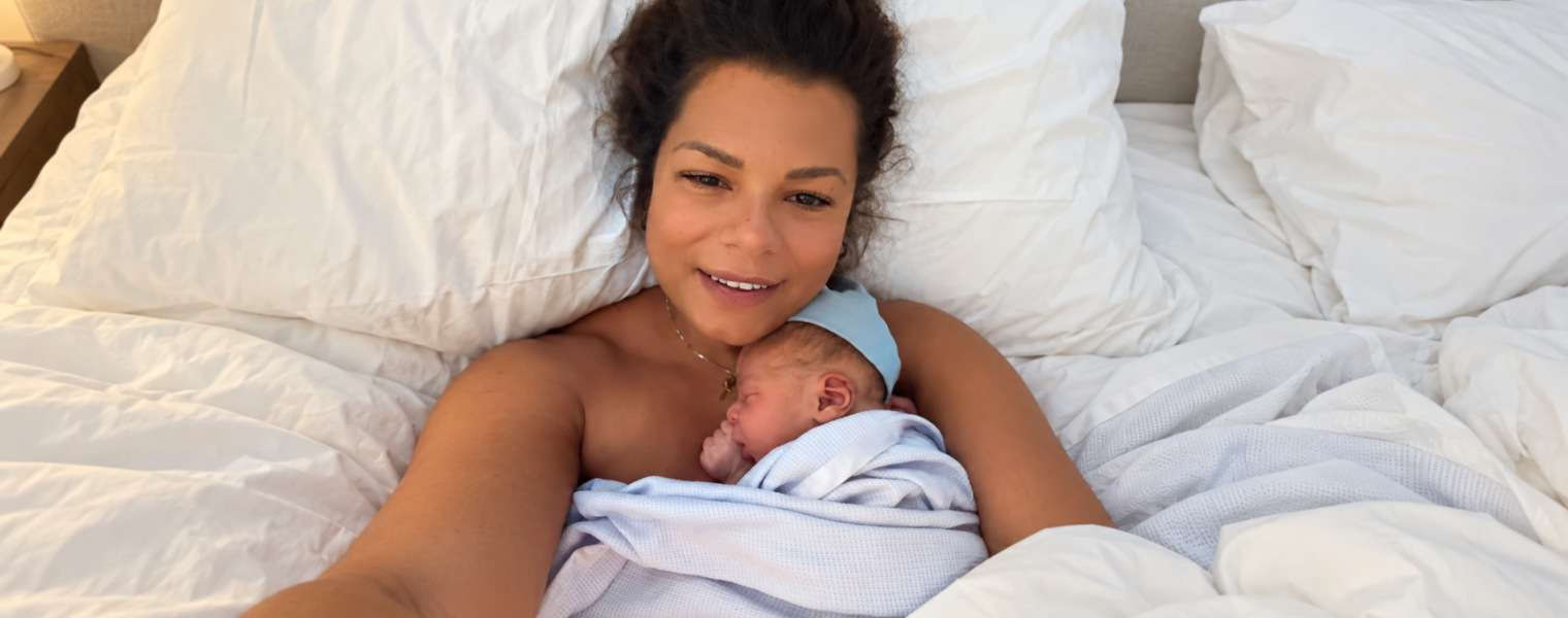 Kassandra holding her newborn son, Landon